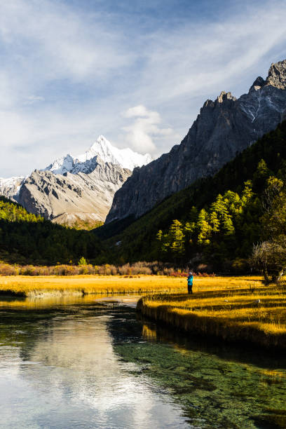 istock snow mountain and reflection in lake 1159975671