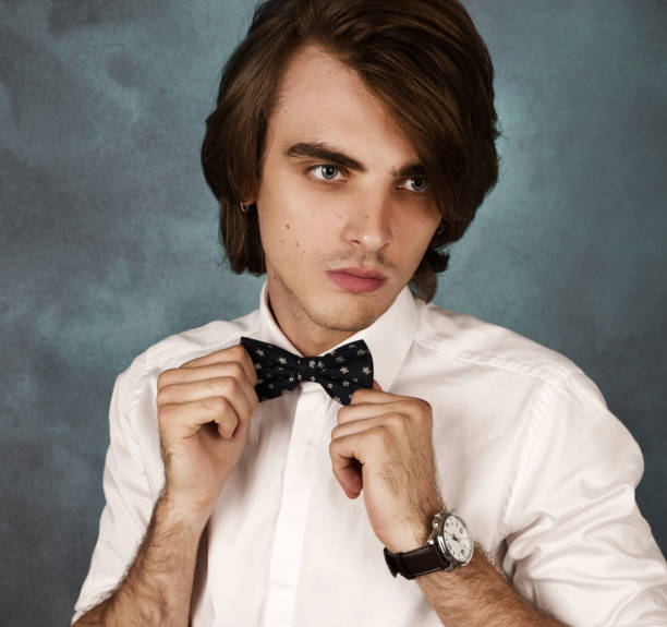 istock Young man wearing white shirt 1159976385