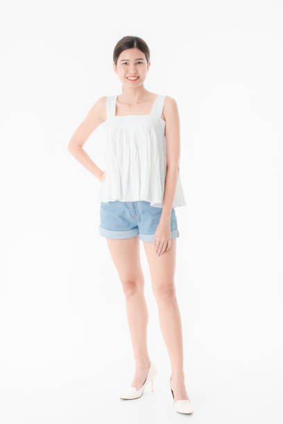 istock Young lady in casual summer outfits 1159977152