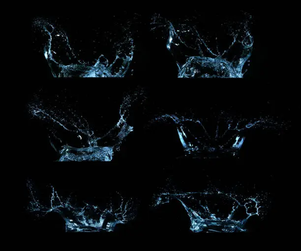 Water splashes collection isolated on black background. Abstract shapes