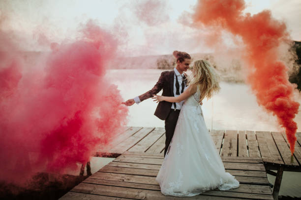 istock Happy newlyweds by the lake 1159979218