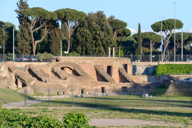 The Circus Maximus ruins, in Italian Circo Massimo The Circus Maximus ruins, in Italian Circo Massimo,  an ancient Roman chariot racing stadium and mass entertainment venue located in Rome, Italy circo massimo stock pictures, royalty-free photos & images