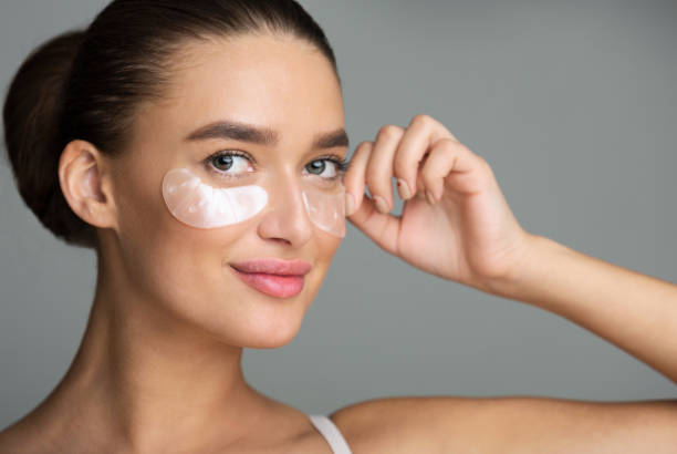 istock Under Eye Treatment. Woman With Patches, Grey Background 1159989590