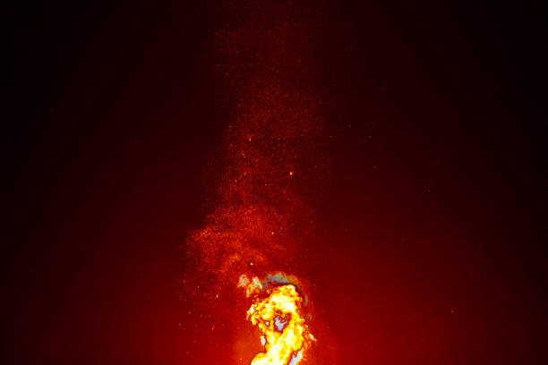 istock Ember Sparks Against Dark Sky 1159990998