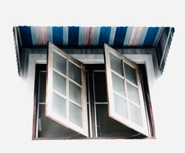 istock Old White Wooden Window on The Wall 1159991723