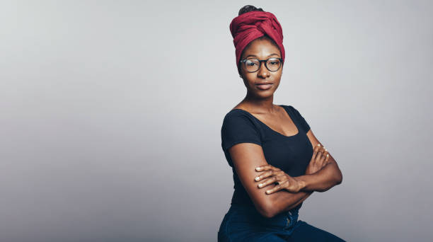 istock African woman in a headwrap 1159991982