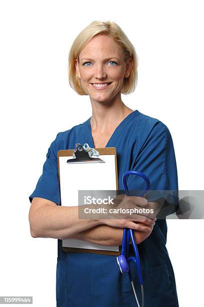 Doctor Holding Clip Board Stock Photo - Download Image Now - Adult, Adults Only, Assistance