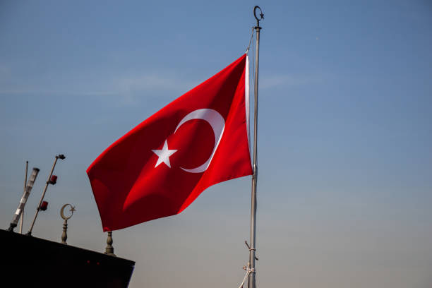 istock Turkish national flag hang on a pole 1159996153