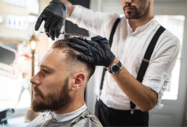 istock Man enjoying a hair cut 1159996434