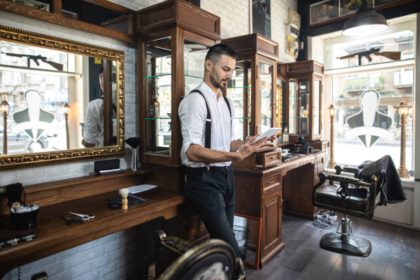 istock Retro style hair dresser taking a break from work 1159996531