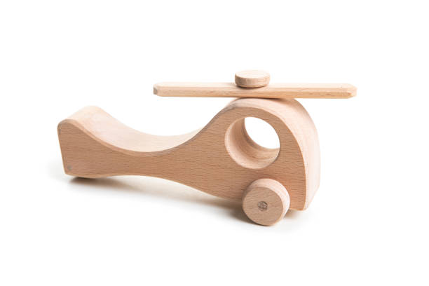 istock Wooden helicopter toy on white background. 1159996630