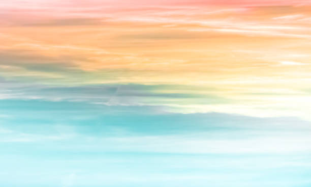 istock Sunset sky - colourful clouds and sky - blue, yellow, orange and red 1159996806