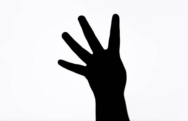 Close-up Of Woman's finger number four. finger showing number four on white background isolated. copy space.