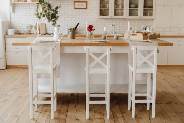 istock White Cozy Kitchen Island Table at Home Interior 1159999325