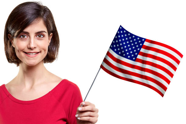 istock Young Woman Is Holding American Flag 1160000138