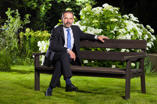istock Businessman sitting on the bench 1160000361