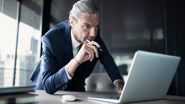 istock Businessman working on the laptop 1160000436