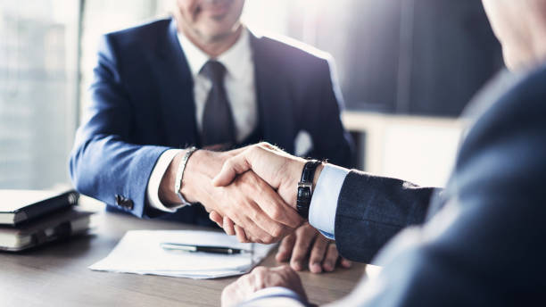 Business partnership meeting in office Business partnership meeting in office business handshake partnership human hand stock pictures, royalty-free photos & images