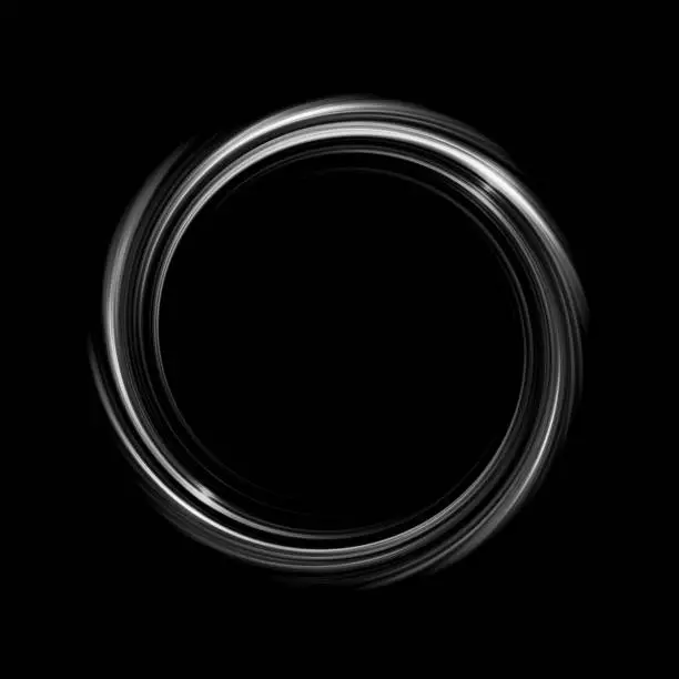 Photo of Glowing white spiral with light circle on black backdrop, abstract background