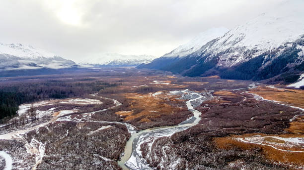 istock Helicopter flying over Alaska glacier 1160010759