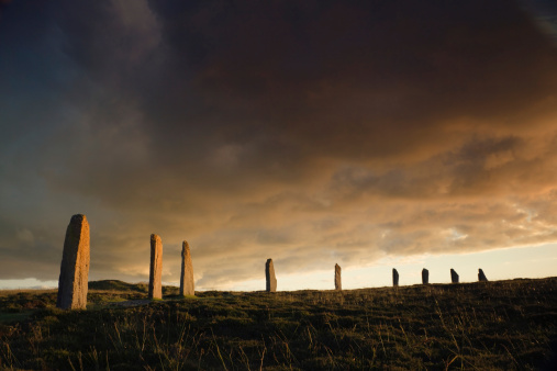 Ring of Brodgar in dramatic evening light and cloudscape