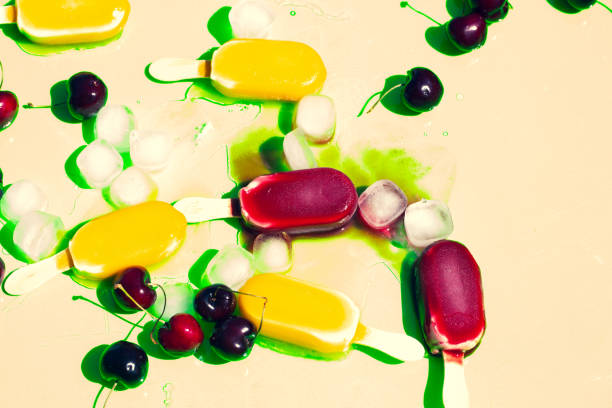 Popsicles, messed with cherries and ice cubes