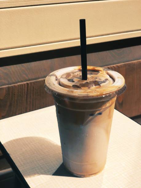 istock Iced coffee to go on a table 1160014817