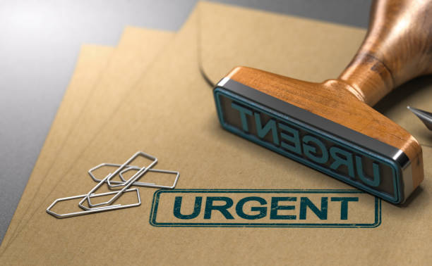 istock Urgent Letter, Kraft Envelope and Rubber Stamp. 1160014869