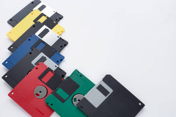 istock Group of multi-colored flexible disks isolated on a white background. Retro technology. 1160019318