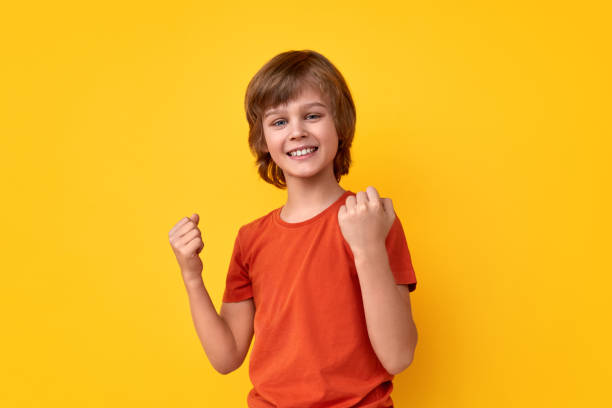 istock Cheerful boy celebrating success 1160023876