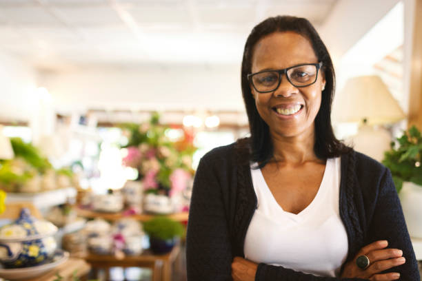 istock Woman in a ceramic store, looking at camera 1160024417
