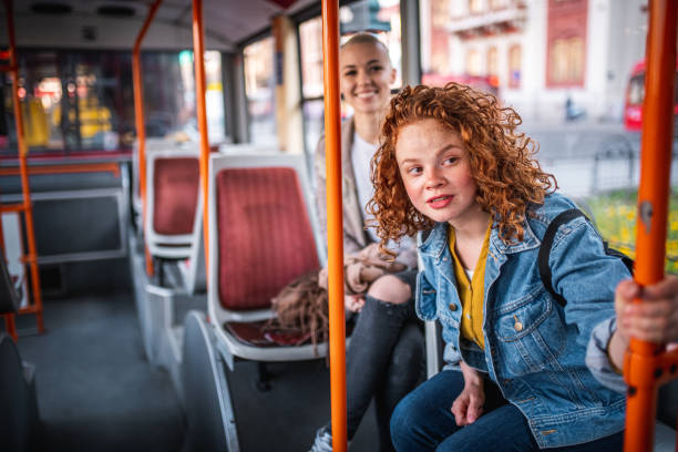 istock Two friends at the bus 1160025828