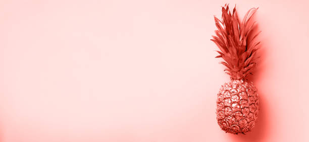istock Creative layout. Gold pineapple on grey background with copy space. Top view. Tropical flat lay. Exotic food concept, crazy trend. Banner 1160028207