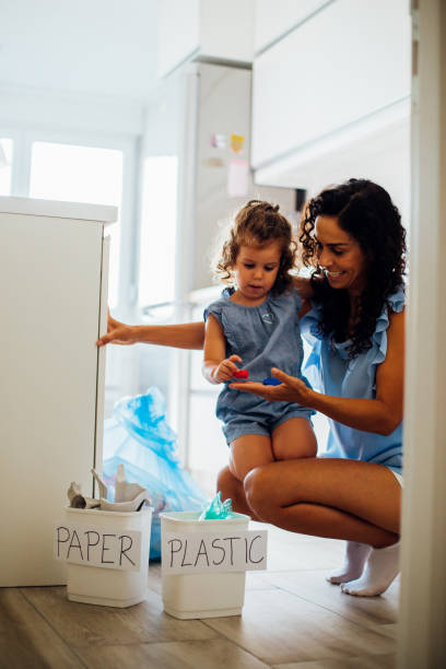 istock Happy family recycling 1160028470