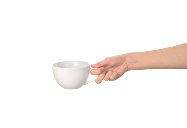 istock white empty cup in the womens hand isolated 1160028965