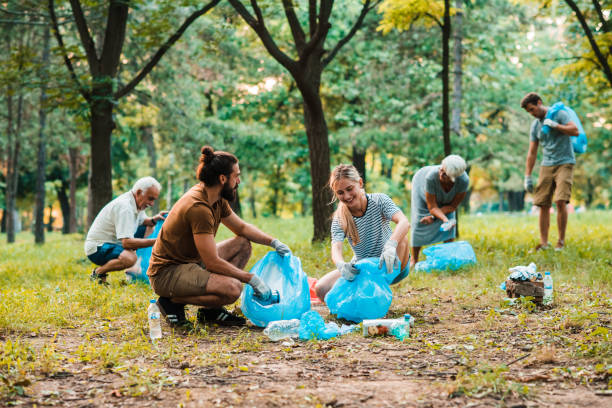 istock People collecting trash and recycling 1160029069