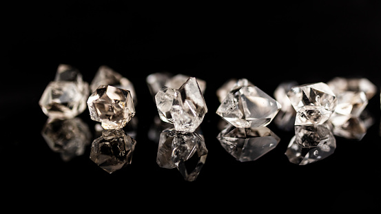 Herkimer Diamond with Refection and black background with copy space.
