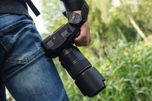 istock A photographer with the camera. 1160030407
