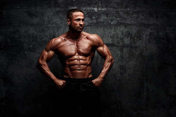 istock Power! Strong Muscular Men posing and Flexing Muscles 1160031687