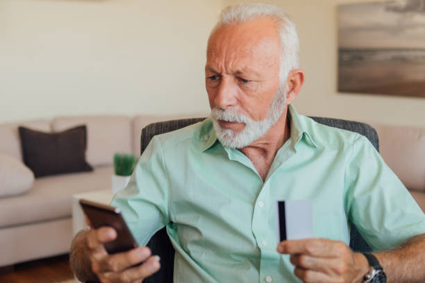 istock Mature man buying on the internet 1160036092