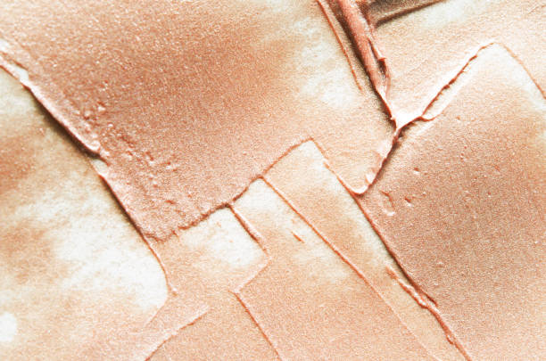 Beige smears of crushed highlighter or luminizer. - Image