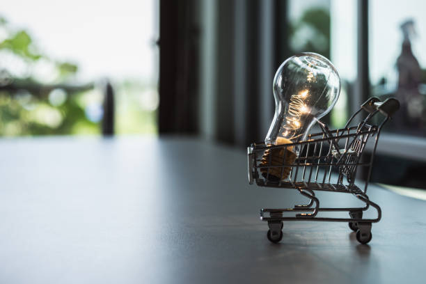 istock Light bulb with Shopping cart on a white background. Creative light bulb idea, power energy or business idea concept. 1160036818