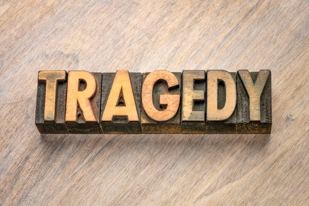 istock tragedy word in letterpress wood type 1160037837