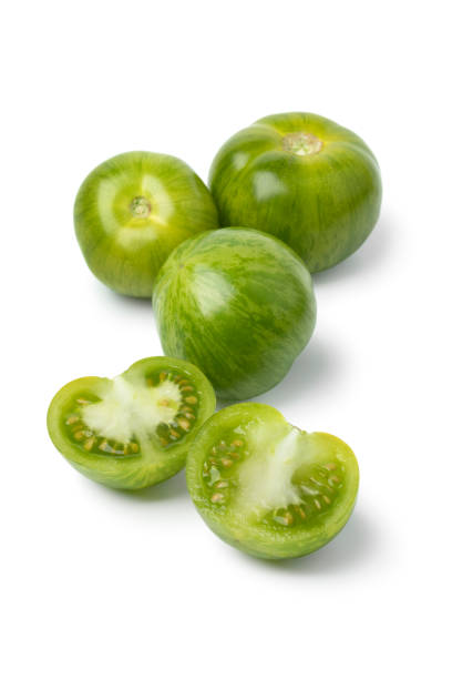 istock Green striped tomatoes and halved ones 1160039085
