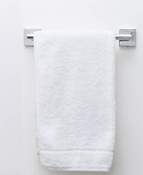 istock Modern bathroom towel dryer on white wall background with copy space 1160041021