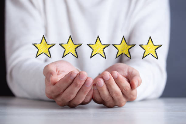 istock man hand stars in screen 1160041134