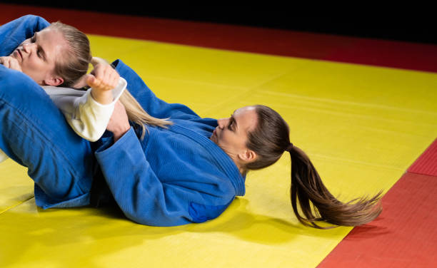 istock Two Female Judokas Sparring 1160043681