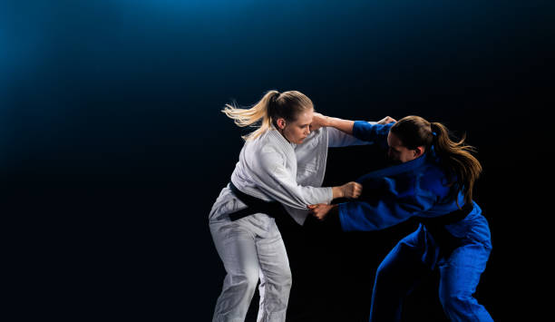 istock Female Judo Players Competing During Match 1160043701
