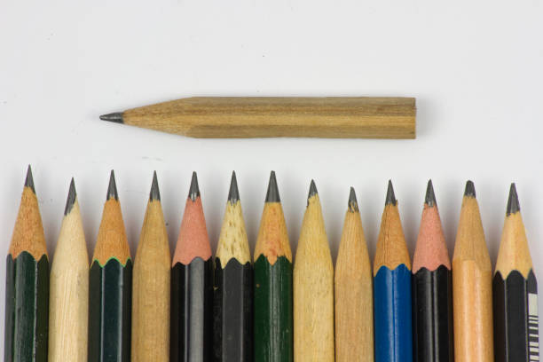 istock Pencil with sharpening on white paper background. 1160044313