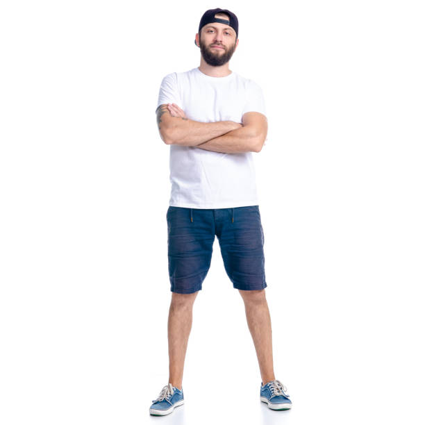 istock Man in shorts and cap standing happiness smiling 1160045003